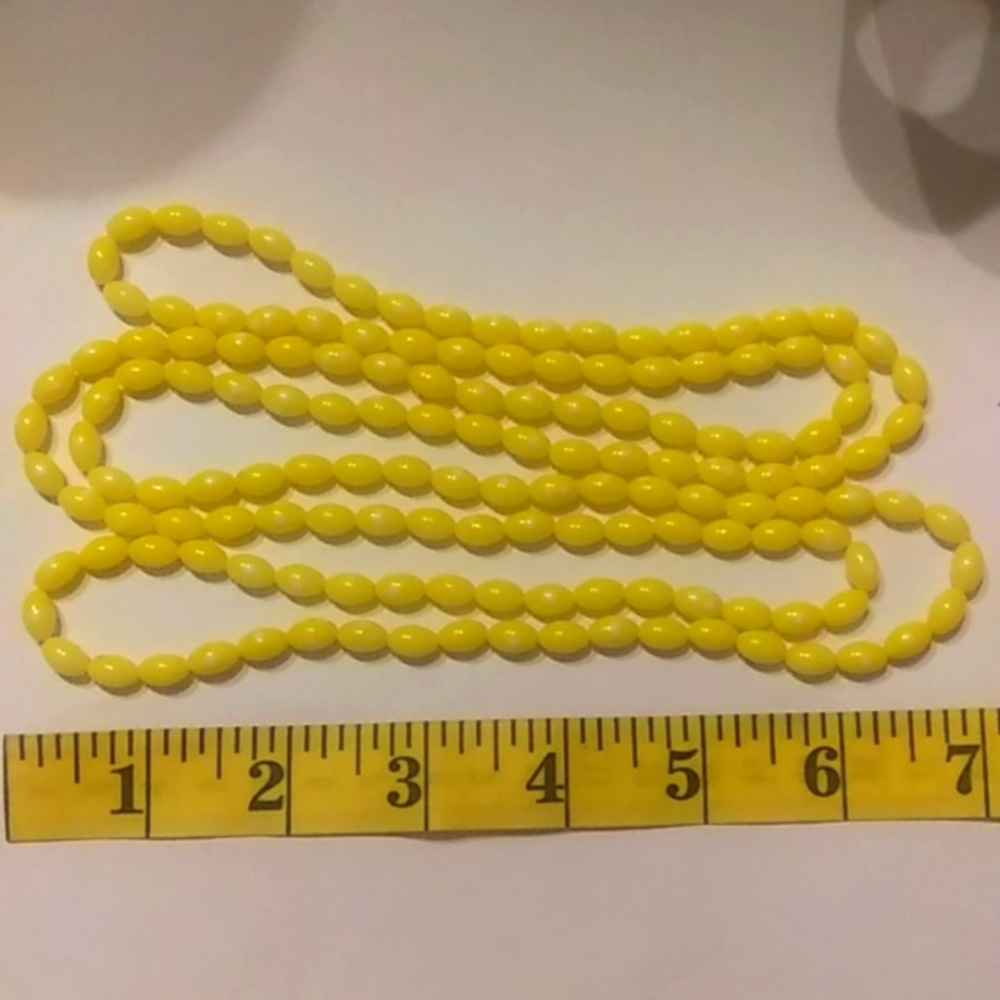 Yellow vintage plastic bead necklace 53"